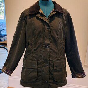 Barbour Olive Green Beadnell waxed cotton jacket with plaid lining